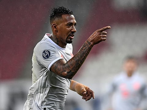 Bayern's Jerome Boateng celebrates.
