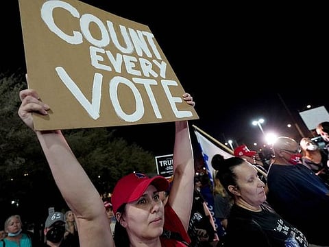In Pictures: Americans rally over post-election uncertainty