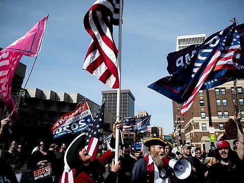 Supporters of President Donald Trump protest in Detroit against alleged vote manipulation 