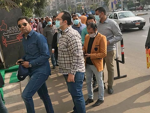 Voters queue up for casting their ballots in Cairo. 