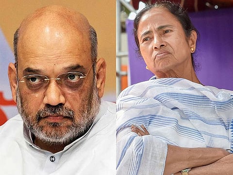 Amit Shah [L] and Mamata Banerjee [R]