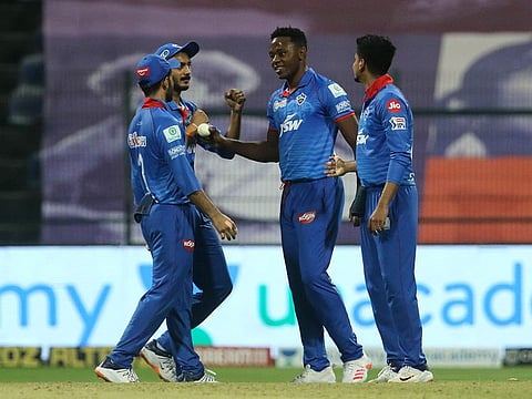 Delhi Capitals players celebrate the wicket of Shreevats Goswami of Sunrisers Hyderabad. 