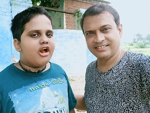 Rajeev Nigam (right) with his son Devraj.