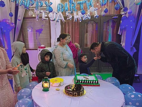 Rashtriya Janata Dal leader Tejashwi Yadav celebrates his birthday with his family, in Patna on Monday. 