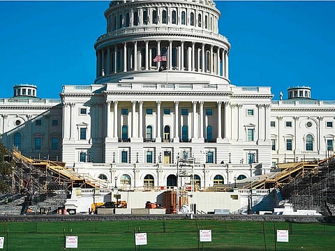 The US lawmakers passed a short-term bill to lift the nation’s borrowing authority Tuesday, averting the threat of a first-ever debt default.