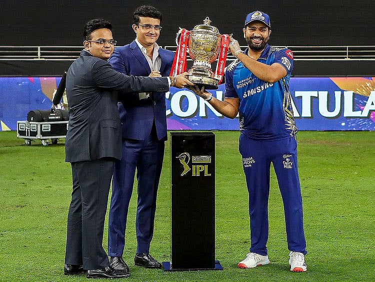 BCCI President Sourav Ganguly and BCCI Secretary Jay Shah present the Indian Premier League (IPL) 2020 winners trophy to Mumbai Indians captain Rohit Sharma