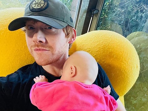 Rupert Grint with daughter Wednesday.