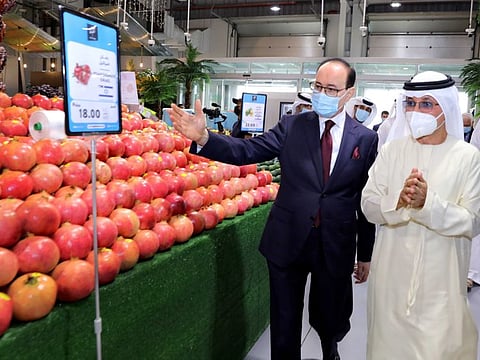Shlomi Fogel, Chairman of Carmel Agrexco and Sultan Ahmed Bin Sulayem, Group Chairman and CEO of DP World, at the opening of the first-ever stall for the Israeli agriculture products in Dubai.