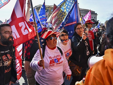 Supporters of President Donald Trump attend a Make America Great Again rally near the White House in Washington, November 14, 2020. 