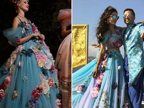 The Dolce & Gabbana dress and dress worn by Sana Sajan have similarities.