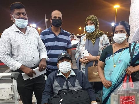 Raghavan and his wife Sarojini along with community members ahead of his departure