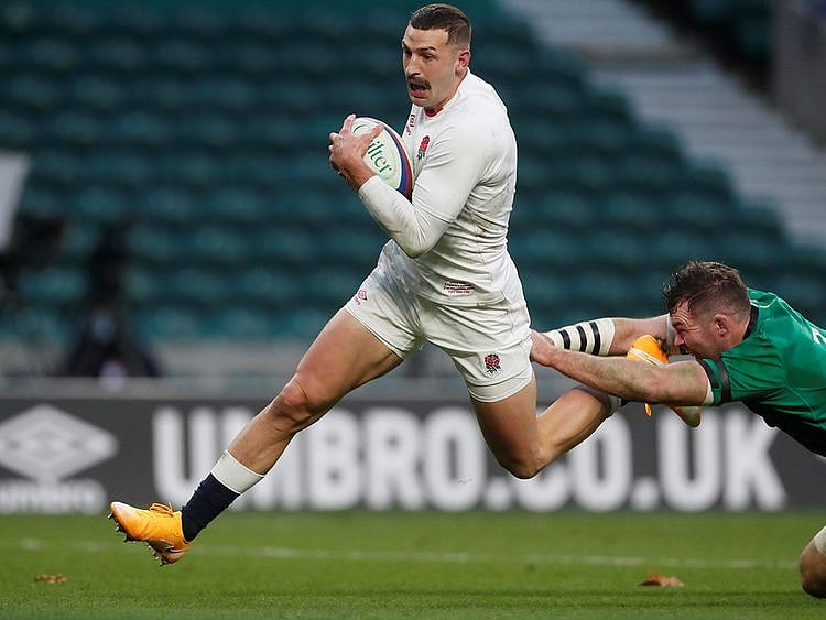 England's Jonny May scores a try against Ireland
