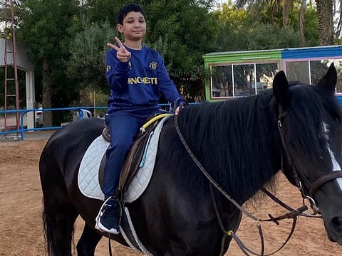 Khalifa Al Khyeli during his riding lessons.