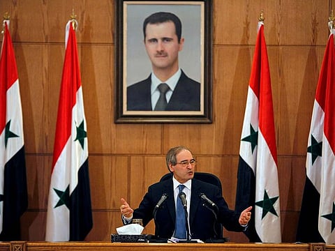 Syrian Deputy Foreign Minister Faisal Mekdad talks during a news conference in Damascus