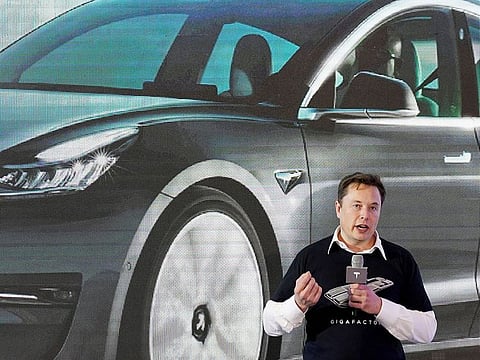 Tesla Inc customers can now buy its electric vehicles with, its boss, Elon Musk, said on Wednesday.