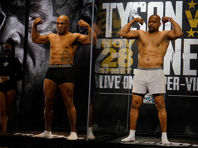 Mike Tyson (left) and Roy Jones