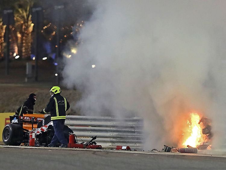 Kyvat's car burst into flames on the opening lap of the Bahrain Grand Prix