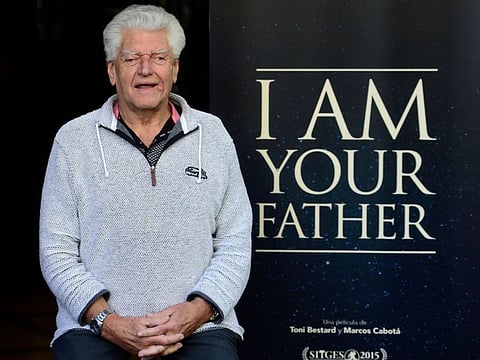 This file photo taken on November 18, 2015 during a photocall in Madrid shows British actor David Prowse, the British actor behind the menacing black mask of Star Wars villain Darth Vader, who died aged 85 his agent said on November 29, 2020.