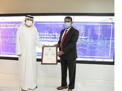 P B Abdul Jebbar, Managing Director of Hotpack Global, receives the Dubai Smart Industry Award 2020 from Eng. Saeed Al Awadi, CEO, Dubai Exports. Up to 46 winners received due recognition at the Business Excellence Awards this year