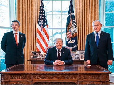 Shaikh Abdullah Bin Zayed Al Nahyan, UAE Minister of Foreign Affairs and International Cooperation, US President Donald Trump and Benjamin Netanyahu, Israeli Prime Minister, at the White House during the signing of the Abraham Accords
