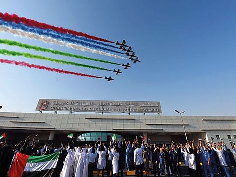  The UAE Air Force’s aerobatic team, Al Fursan conducts a show over Shaikh Khalifa General Hospital in Ajman. This event is organised to appreciate the fundamental role played by the nation’s medical, administrative and technical staff, who are working round the clock under tough circumstances to ensure public safety and health during the pandemic