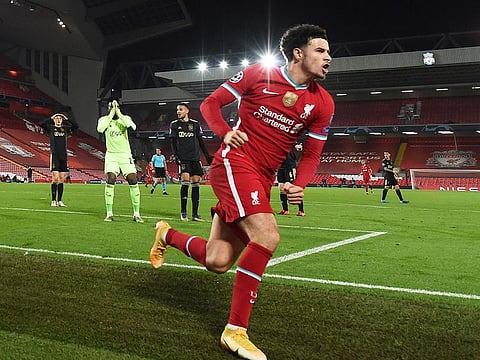 Liverpool's Curtis Jones celebrates scoring.