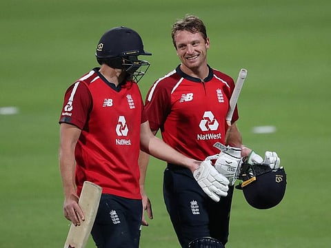Dawid Malan (left), now the world No.1 batsman in ICC T20 batsmen's rankings, with Jos Buttler after England completed a 3-0 sweep in Cape Town on Tuesday.
