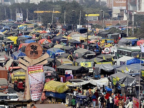 Vehicles of farmers queue up blocking the road during a protest against the new farm laws, at the Singhu Border in New Delhi on Wednesday, December 2, 2020. 