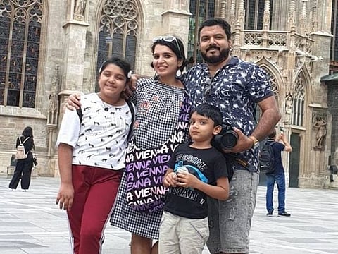 Simimol Raijo, 34, a computer teacher from India, joined in the UAE anthem-singing with her two children and husband.
