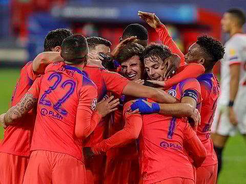 Chelsea's Olivier Giroud celebrates with teammates after scoring his side's third goal.