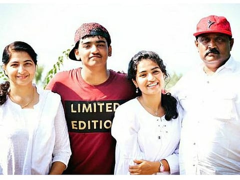 George Jacobs, right, with his family.