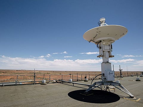 A view of the Woomera Prohibited Area (WPA) is seen in the background with machinery on the roof the Royal Australian Air Force's (RAAF) Woomera Range Complex in Woomera in South Australia on December 4, 2020, ahead of the Japan Aerospace Exploration Agency's (JAXA) Hayabusa 2 probe's expected sample drop to earth after landing on and gathering material from an asteroid some 300 million kilometres from Earth