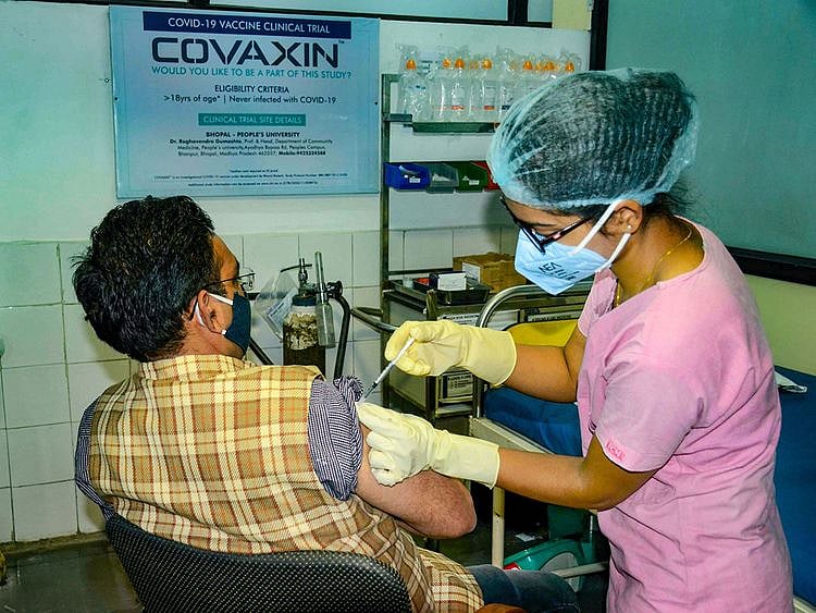 A medic administers Covaxin, developed by Bharat Biotech