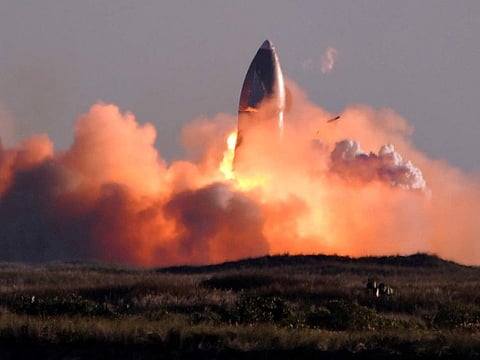SpaceX's first super heavy-lift Starship SN8 rocket explodes during a return-landing attempt after it launched from their facility on a test flight in Boca Chica, Texas U.S. December 9, 2020.