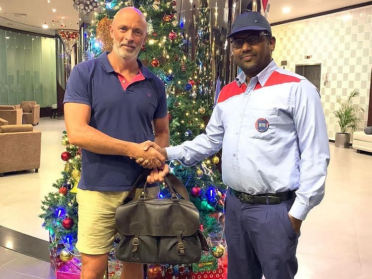 NAT Alan Gardner and taxi driver Firos CK-1607663242114