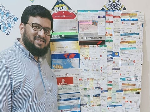 Sahad Sattar with his collection of boarding passes.