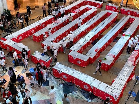 A 700 METRE Christmas Stollen Charity Cake Sale in Dubai