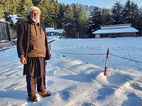  Mohammad Naseem poses for a photograph in the Shogran hill area in Kaghan Valley, northern Pakistan.