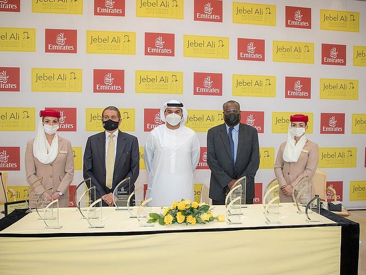 Sheikh Rashid Bin Jamal bin Khalifa Al Maktoum, Emirates Sales Manager, with Shareef Al Halawani, Jebel Ali Racecourse General Manager and Yasir Mabrouk, ERA representative. 