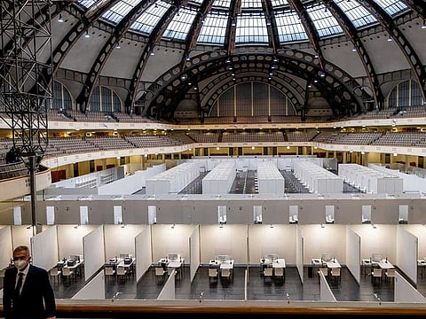 Frankfurt's mayor Peter Feldmann stands in the Festhalle in Frankfurt, Germany, during the introducing of a vaccination centre on Thursday, Dec. 17, 2020. German states say they expect vaccination to start on Dec. 27, 2020.