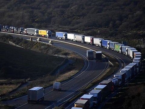The Dover Traffic Access Protocol (TAP) scheme on the A20 is seen in action as freight lorries queue on the main route into the port of Dover on the south coast of England on December 17, 2020.