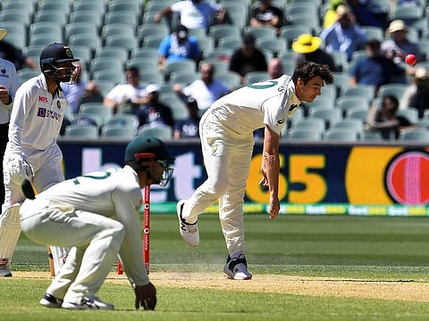 Australia's Pat Cummins sends down a delivery.  