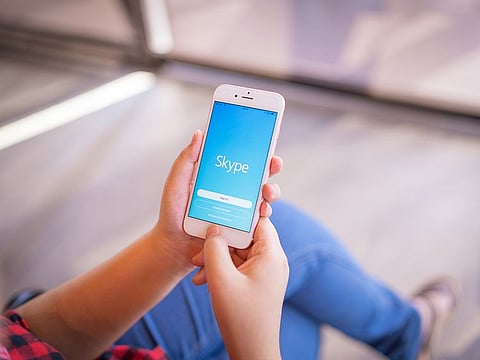 'Together Mode' is a viewing option that makes it appear as if all meeting participants are located in the same physically shared space instead of via a traditional grid view.