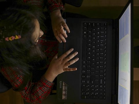A young student attends an online class at her home in Mumbai. India has the world’s second-largest pool of internet users, about 600 million, comprising more than 12 per cent of all users globally. Yet half its population lacks internet access, and even if they can get online, only 20 per cent of Indians know how to use digital services, according to government data.