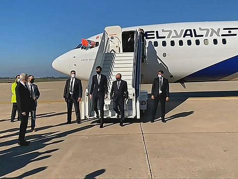 US President's advisor Jared Kushner and Israeli National Security Advisor Meir Ben Shabbat leaving the plane upon landing, in Moroco's capital Rabat, on the first Israel-Morocco direct commercial flight, on Tuesday. 