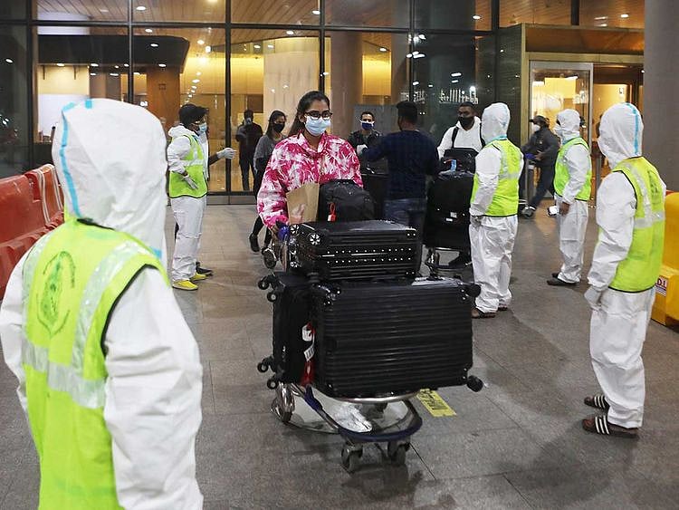Passengers arrive Mumbai mask covid
