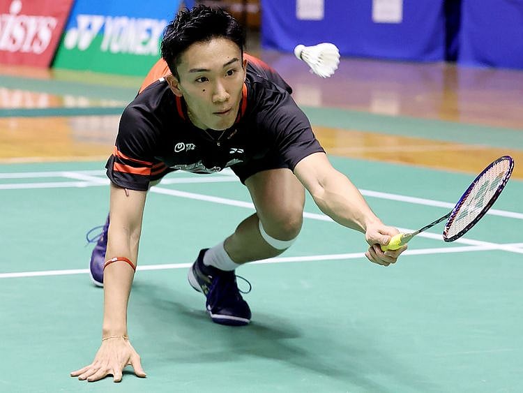 Japan's badminton world No. 1 Kento Momota competes in the first round of All-Japan National Championships in Tokyo on December 23,