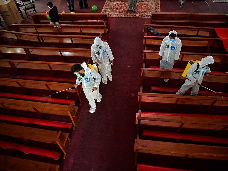 Workers church disinfect Pakistan