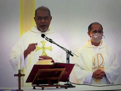 Fr. Lennie J. A. Connully with Fr Chito Bartolo during an online Simbang Gabi address.