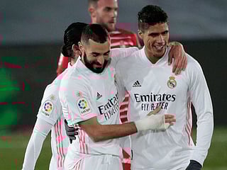 Real Madrid's Raphael Varane, with Karim Benzema. File photo.